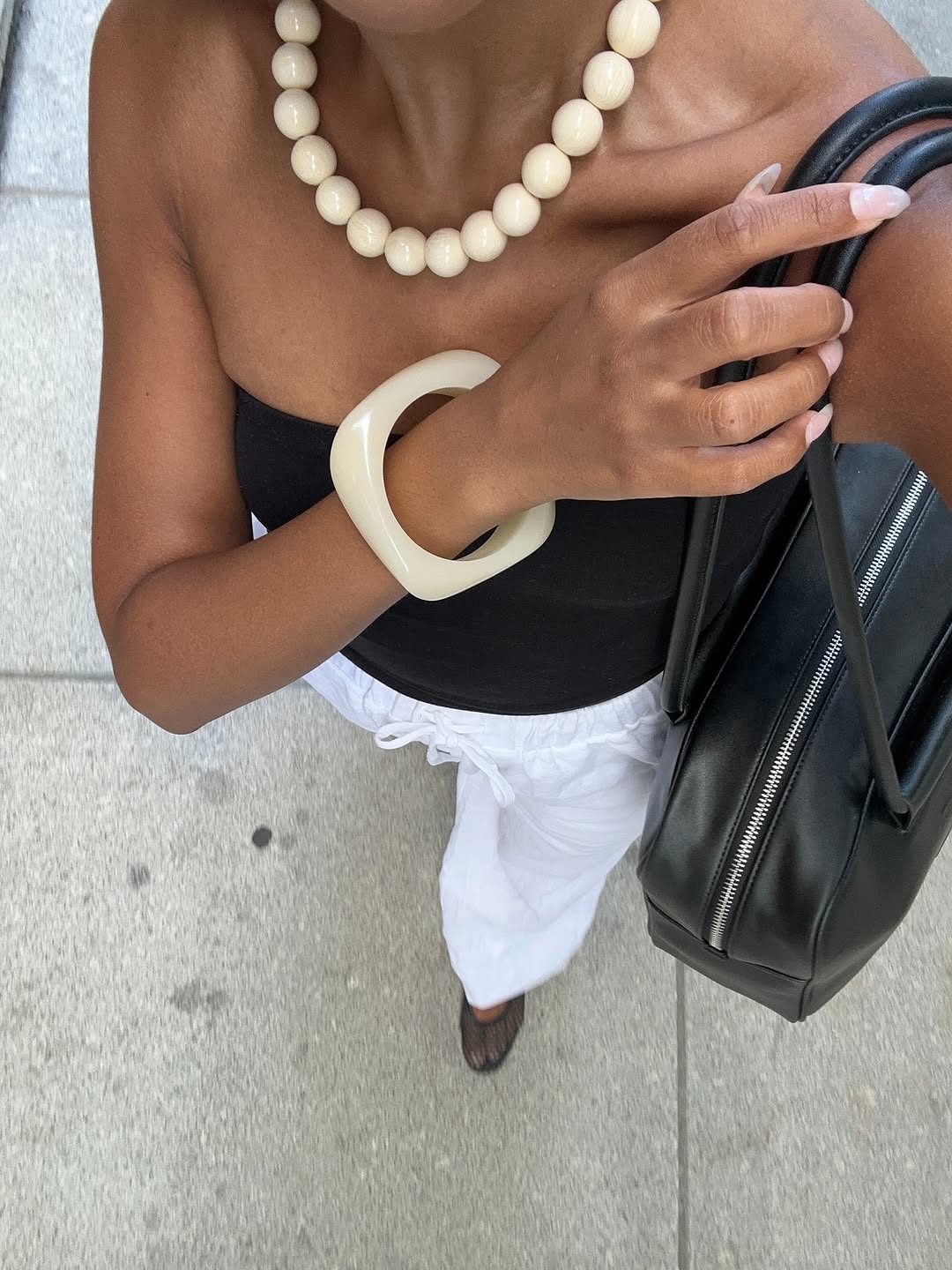 woman wearing bangles early fall 2025 fashion trends