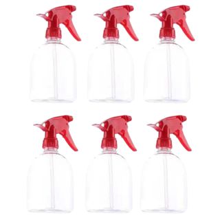 Six clear plastic spray bottles with red lids and triggers