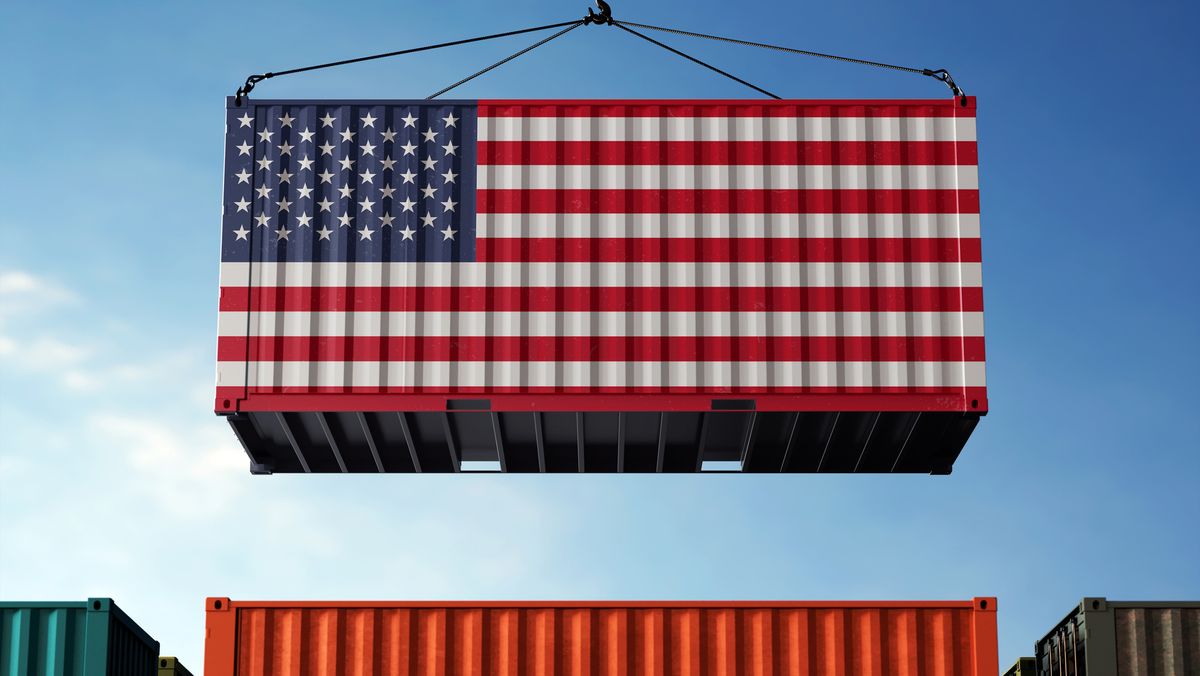 A container emblazoned with the US flag being lowered onto an orange container flanked by green and black containers, representing US tariffs on imports and the US supply chain.