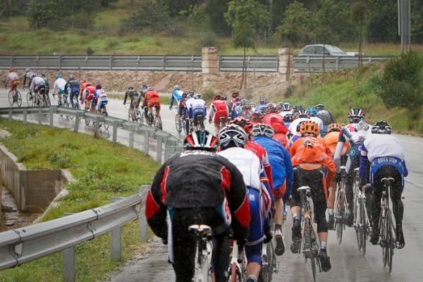 The peloton heading towards the mountains, where more rain and colder temperatures await them.