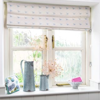 Bathroom window with patterned blind