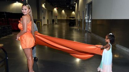 inglewood, california in this image released on may 2, chrissy teigen and luna simone stephens attend global citizen vax live the concert to reunite the world at sofi stadium in inglewood, california global citizen vax live the concert to reunite the world will be broadcast on may 8, 2021 photo by kevin mazurgetty images for global citizen vax live