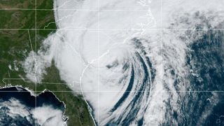 hurricane ian from space as category 1 storm with white clouds off South Carolina coast