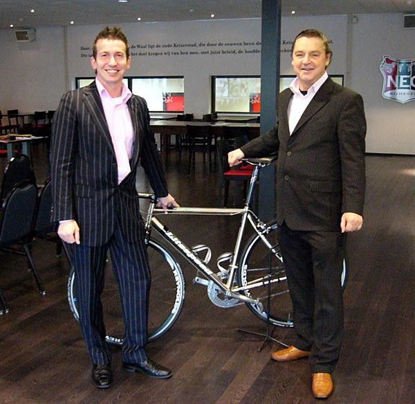 Two senior executives of McDOS, marketing manager Dr Stasiu Teunissen (left) and CEO and owner, Frans Hendriks, pose with one of the team's Litespeeds at the launch of the squad. Dr Tenissen, who holds a PhD in marketing, said firm plans to strongly leverage its sponsorship of the squad.