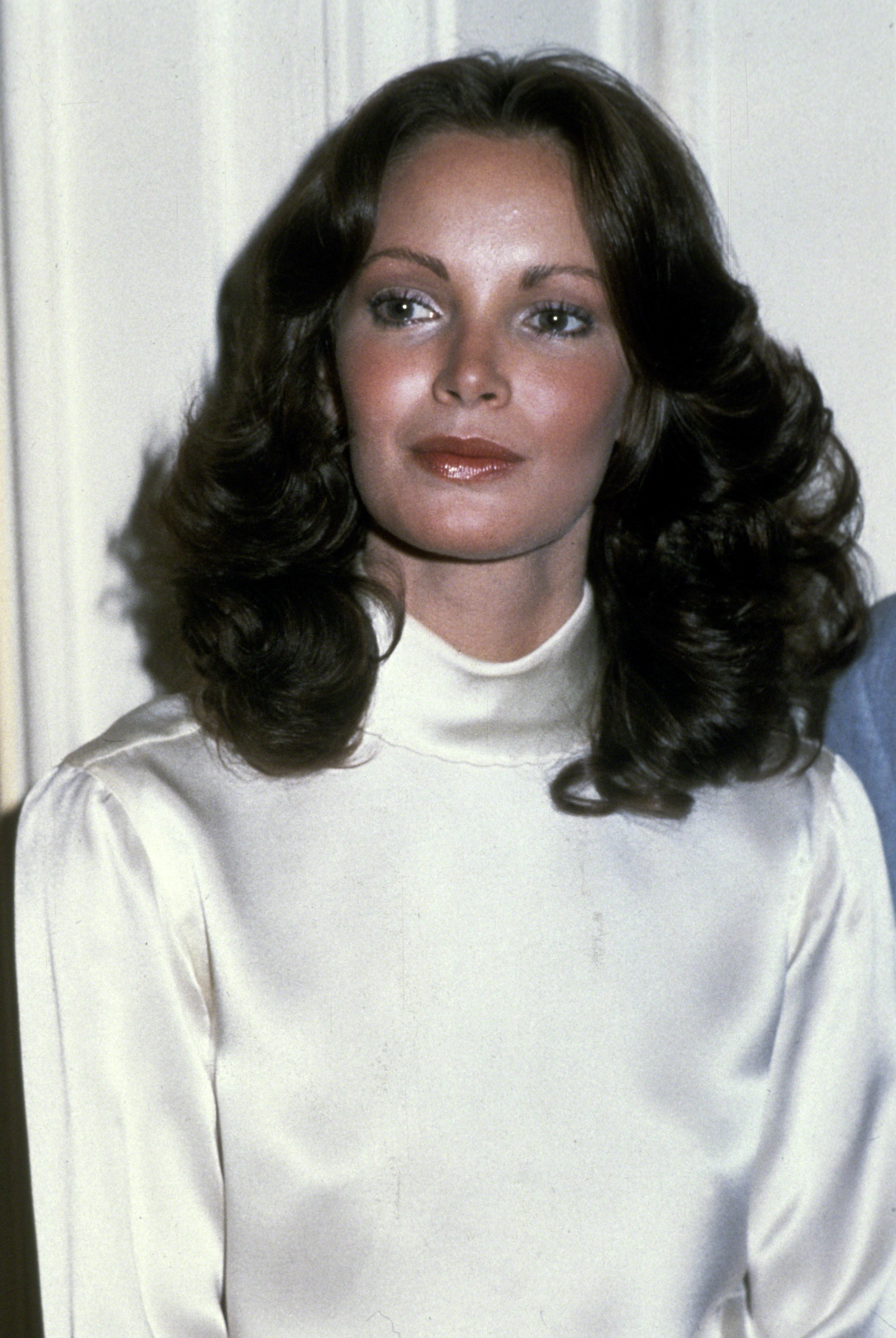 Jaclyn Smith with flushed cheeks and icy, purple eyeshadow in 1978