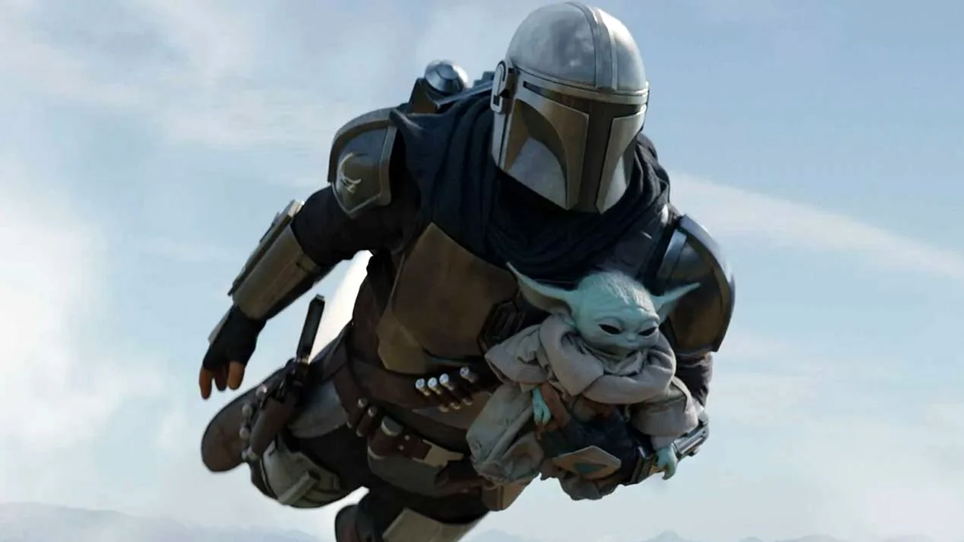 A still featuring The Mandalorian and Grogu.