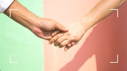 man and woman holding hands on a colored background