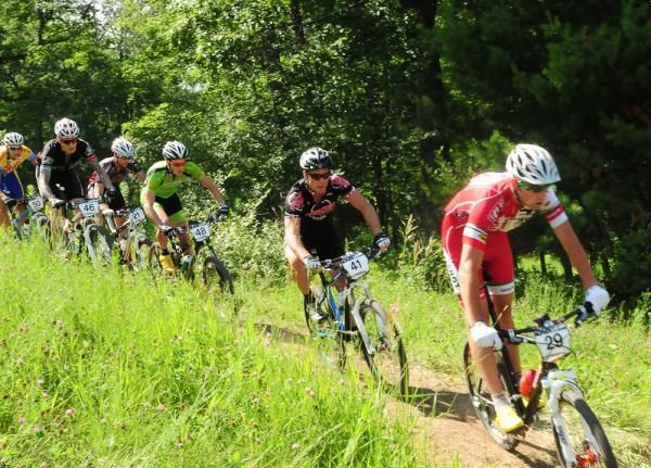 Troy Wells (Cliff Bar) leading a train of riders down the ski hill.