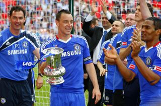 Captain John Terry celebrates with the FA Cup after Chelsea's victory over Portsmouth in the 2010 final