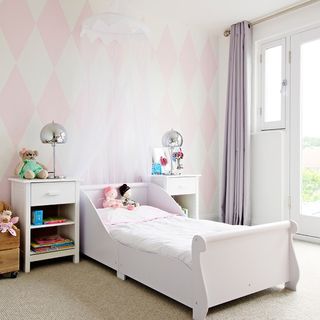 bedroom with diamond shaped wallpaper