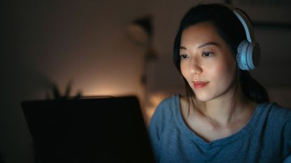 How to cope with bad news: A woman watching the news on her phone