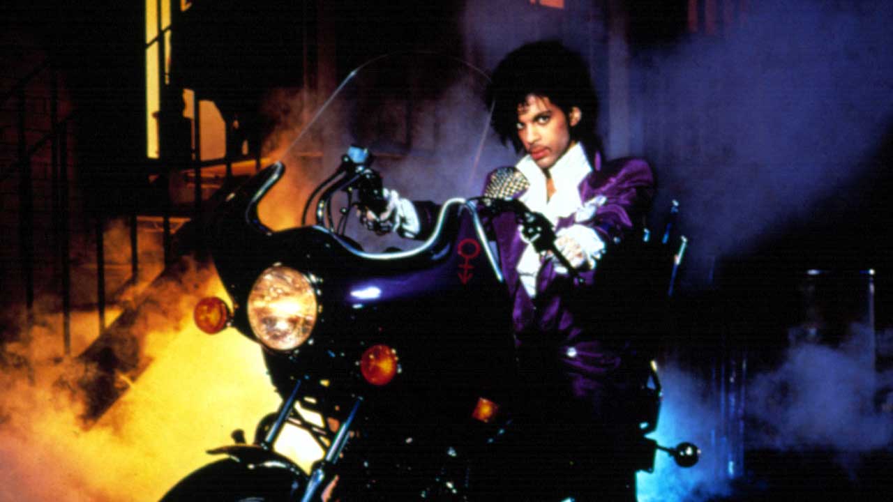 Prince on a motorbike, as pictured on the cover of Purple Rain