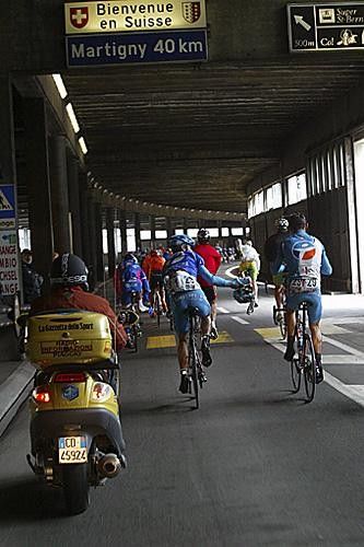 Riders cross the Swiss border but don't have to worry about customs...