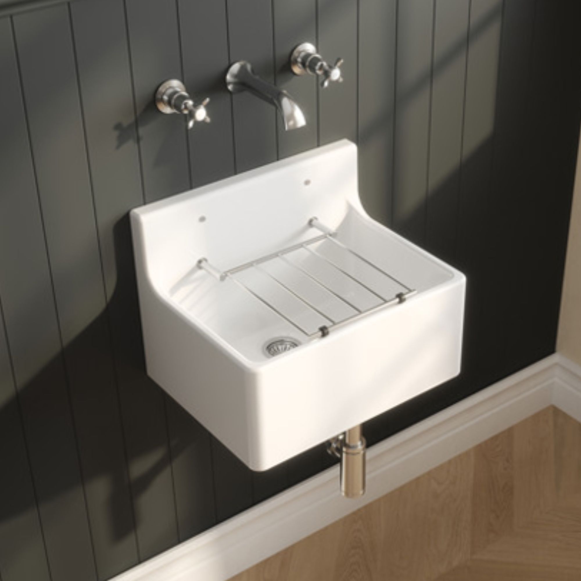 A white wall-mounted basin with wall mounted taps