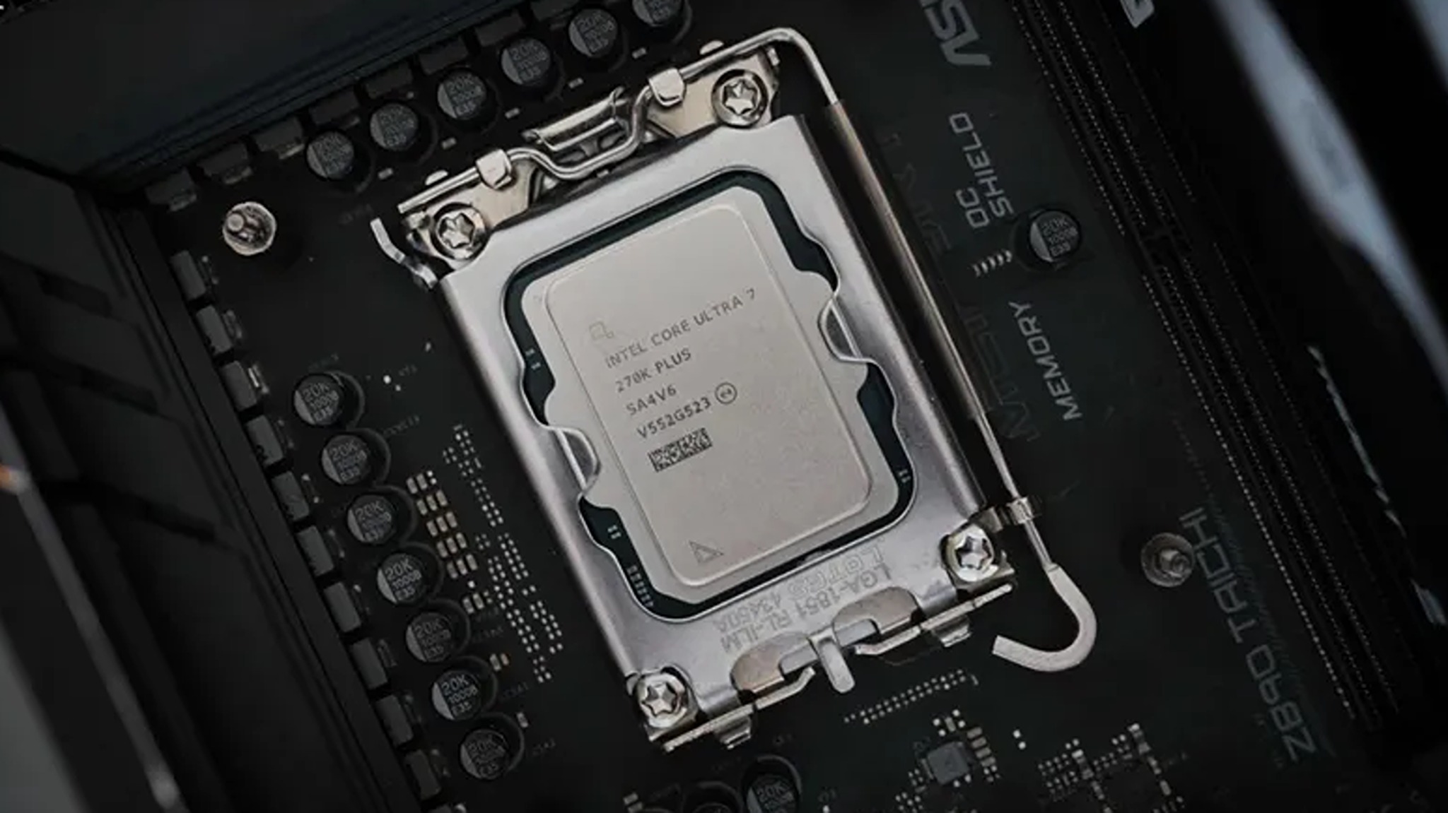 Close-up of an Intel Core i7 CPU seated in a motherboard socket. Surrounding components, circuits, and text labels highlight a tech-focused atmosphere.