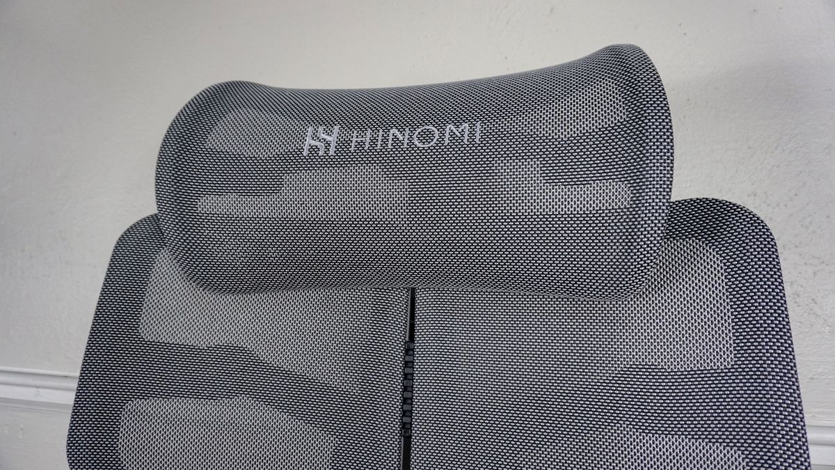 A close-up shot of the Hinomi X1's wide headrest