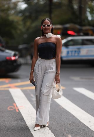 woman wearing tube top and trousers