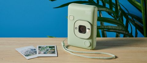 A matcha green Fujifilm Instax mini LiPlay 2-in-1 instant camera and printer