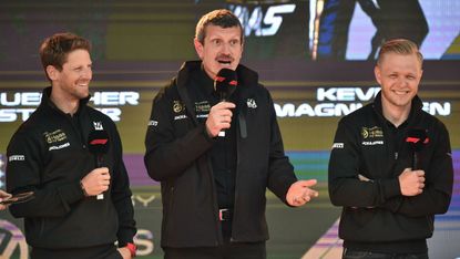 Haas F1 team principal Guenther Steiner with drivers Romain Grosjean (left) and Kevin Magnussen (right)