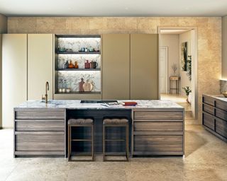 Luxury kitchen with wood island and marble surface