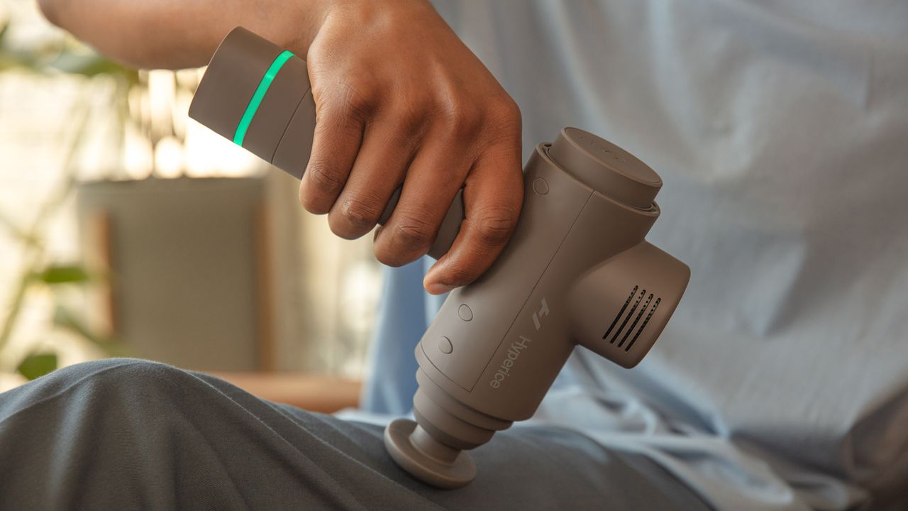 man using hypervolt 2 on his leg
