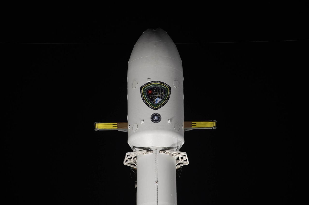 A close up of the payload fairing covering the U.S. Space Force's GPS III SV03 satellite on a SpaceX Falcon 9 rocket.