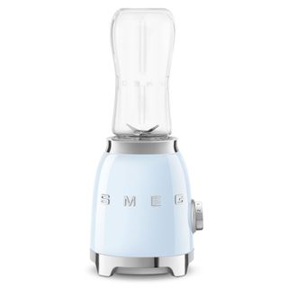 A Smeg Personal Blender in blue on a white background