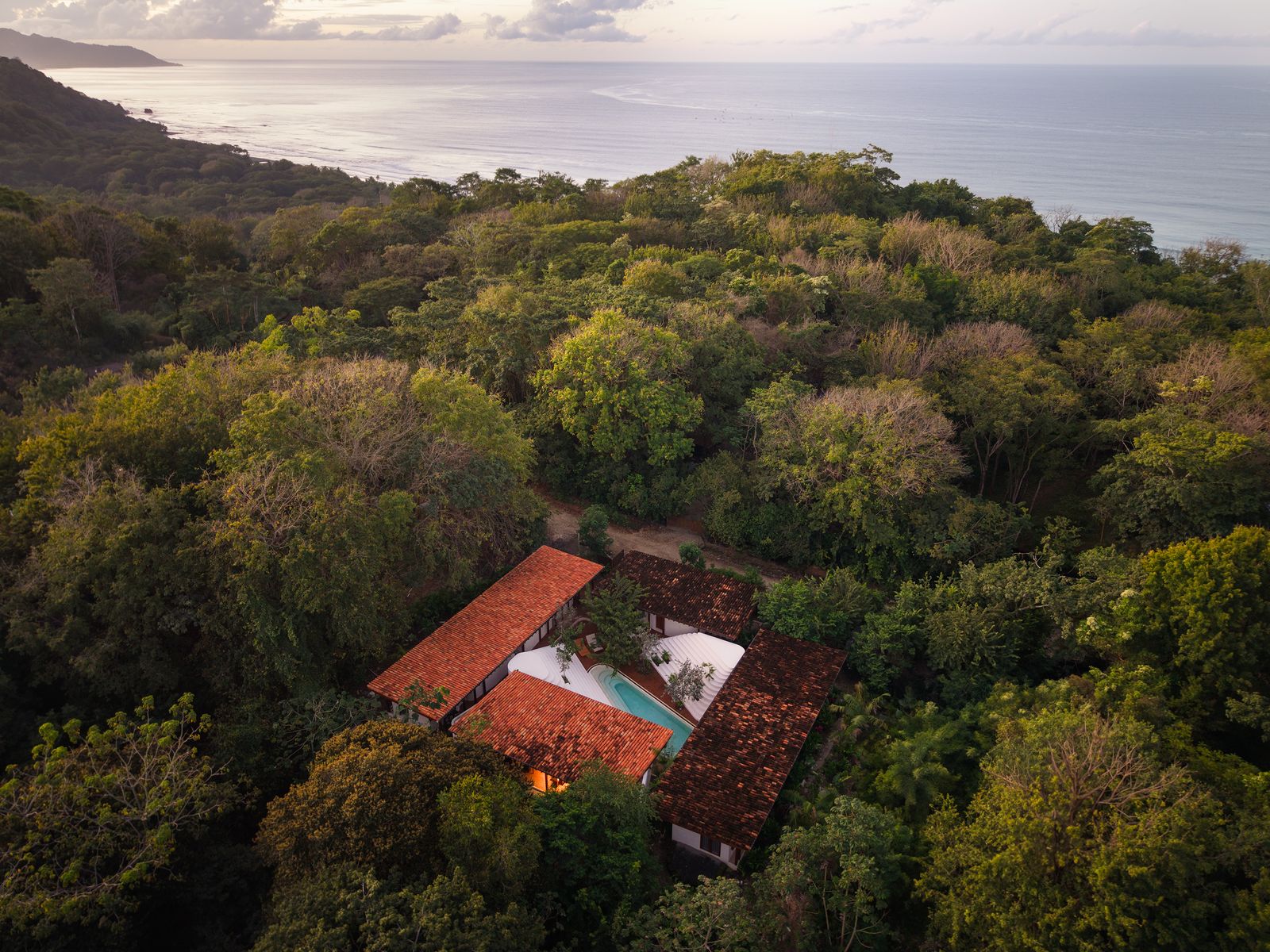 house amid tropical forest