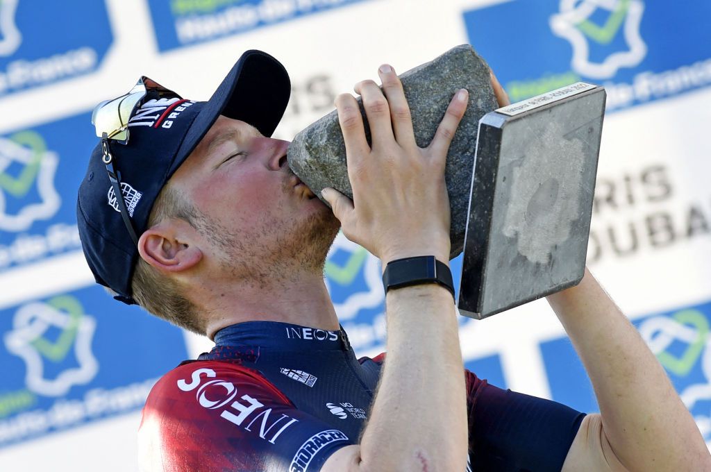 TOPSHOT INEOS Grenadiers Dutch rider Dylan Van Baarle celebrates on the podium after winning the 119th edition of the ParisRoubaix oneday classic cycling race between Compiegne and Roubaix in Roubaix northern France on April 17 2022 Photo by FRANCOIS LO PRESTI AFP Photo by FRANCOIS LO PRESTIAFP via Getty Images
