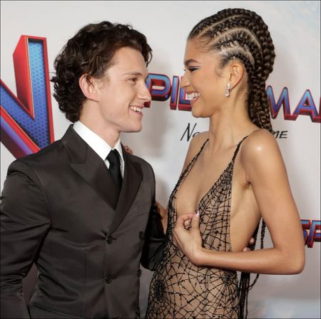 Zendaya and Tom Holland smiling 