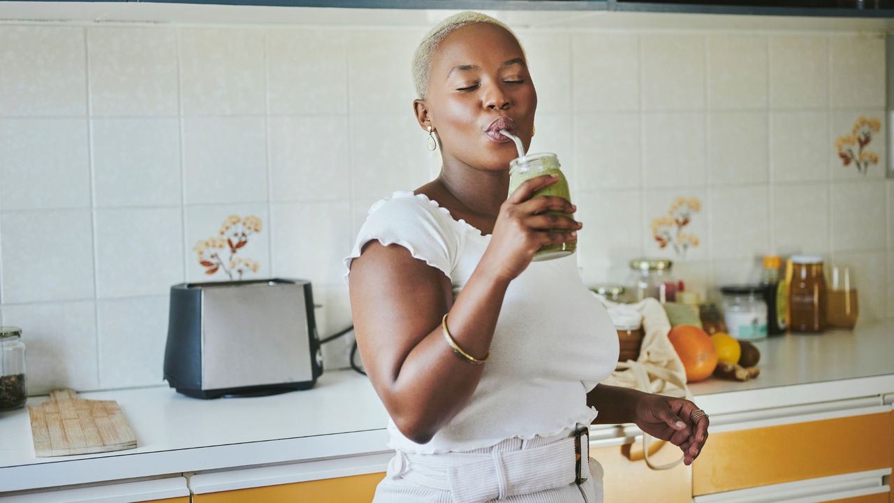 Cambridge Diet: A woman drinking a smoothie