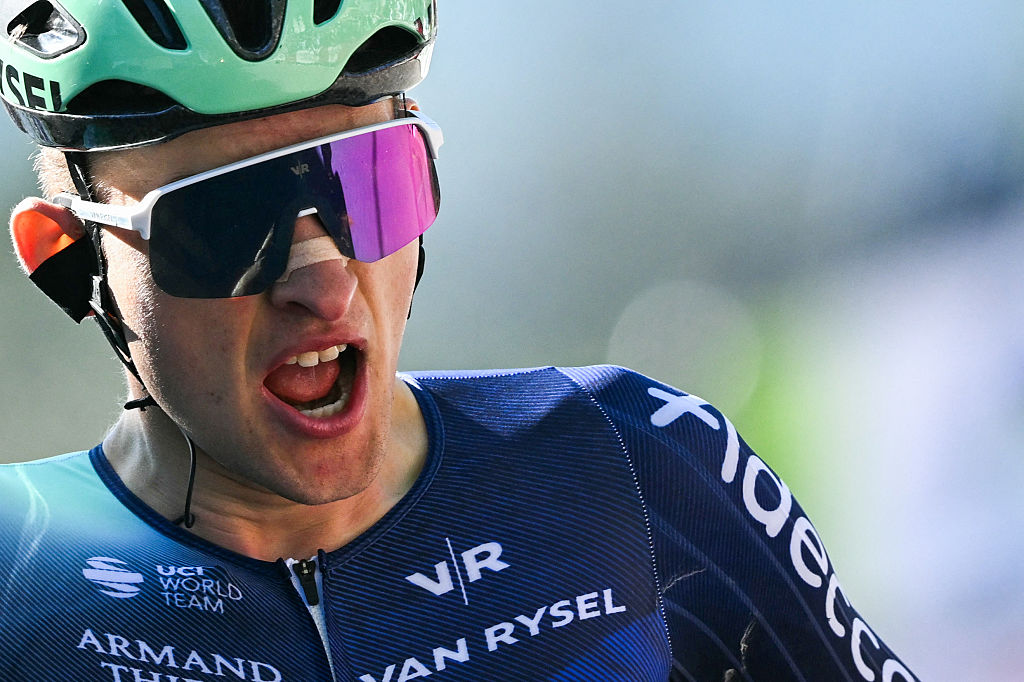 Paul Seixas celebrates as he crosses the finish line to win La Fleche Wallonne.