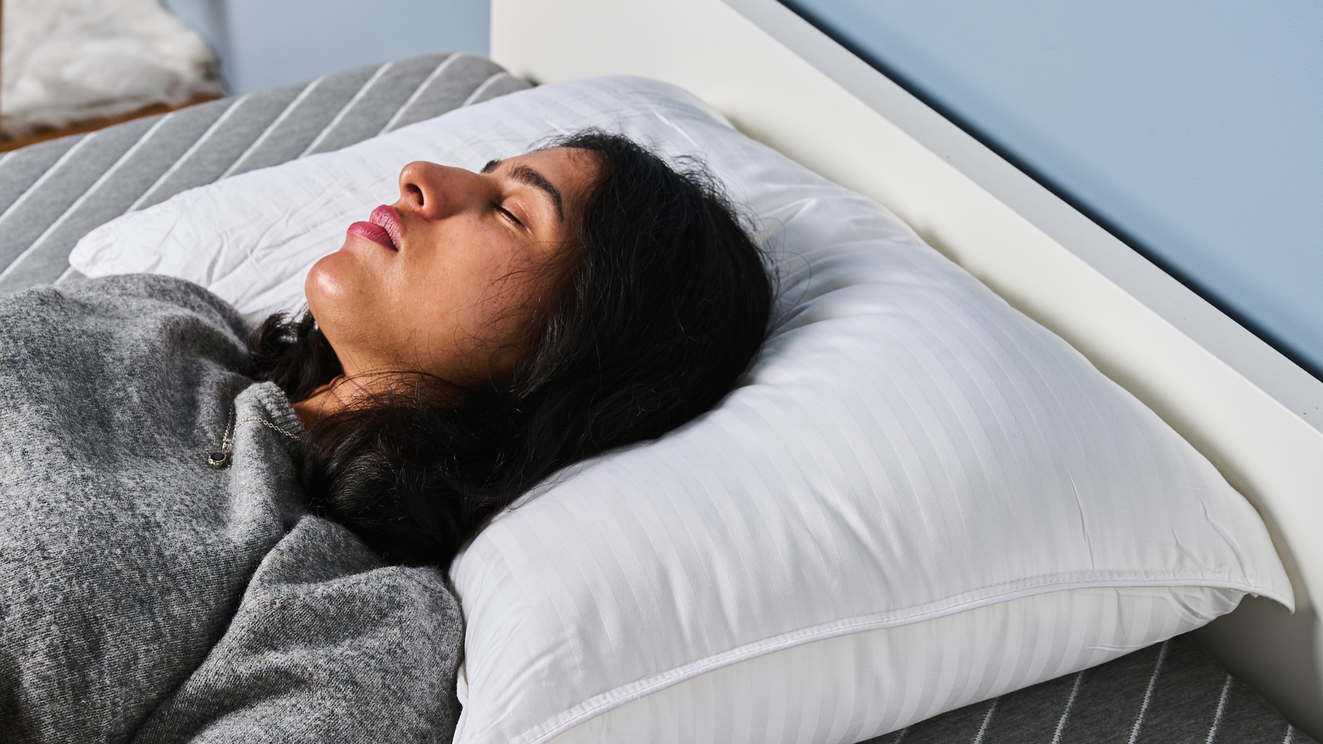 TG Bedding writer testing the Beckham Hotel Collection Pillow in TG Sleep Studio