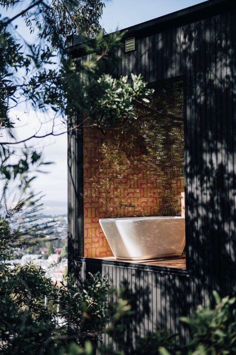 how to bring the outdoors in with glass walls