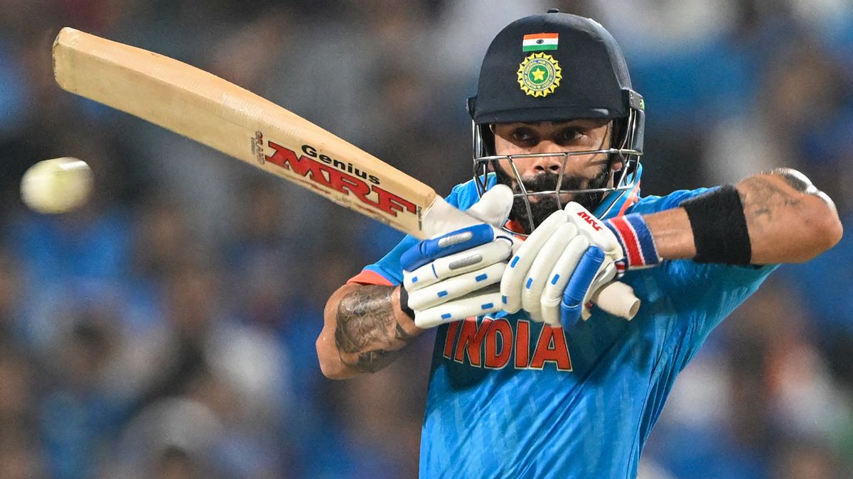 Virat Kohli plays a shot ahead of the India vs New Zealand live stream