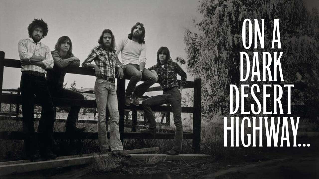 Eagles posing on a rural fence