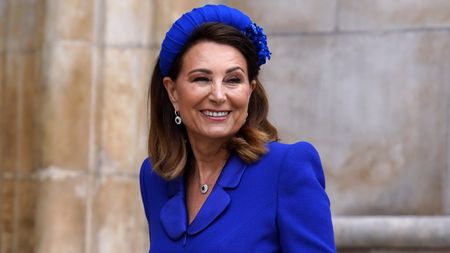 Carole Middleton, wearing royal blue, arrives for King Charles's coronation