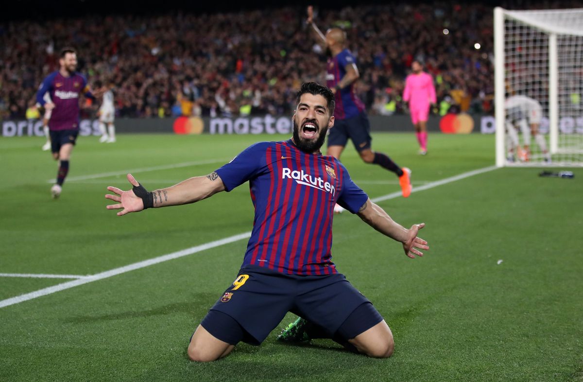 Luis Suarez completes move to Atletico Madrid on two-year ...