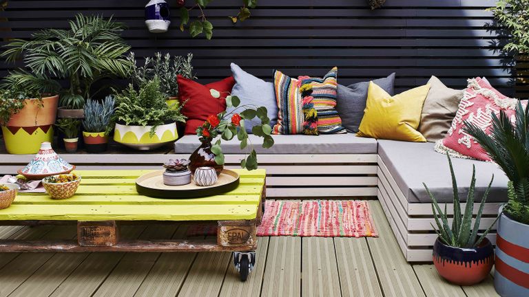 pallet ideas for gardens coffee table painted in Cuprinol