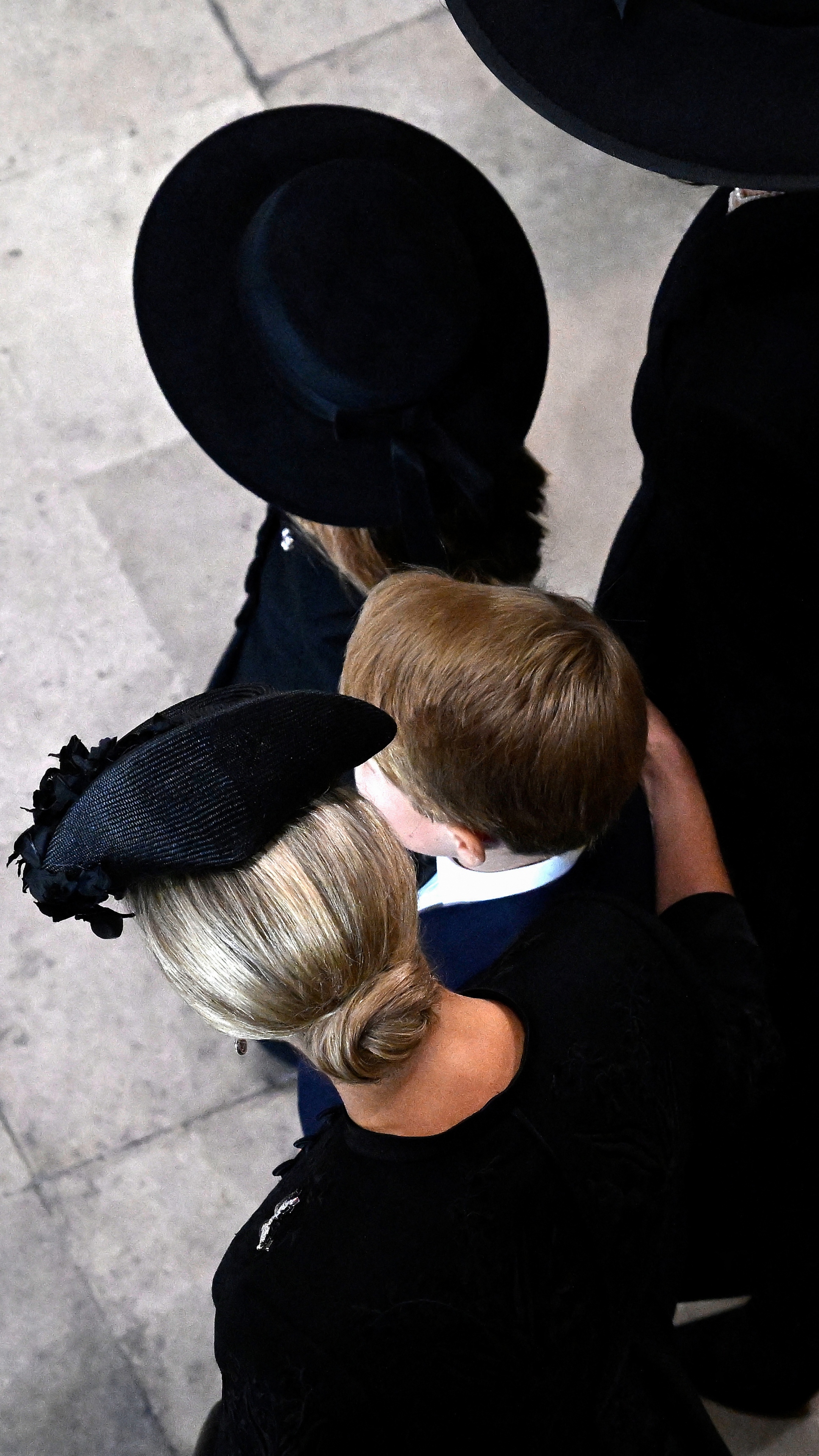 Duchess Sophie drapes her arm over Prince George&#039;s shoulders at the funeral of Queen Elizabeth