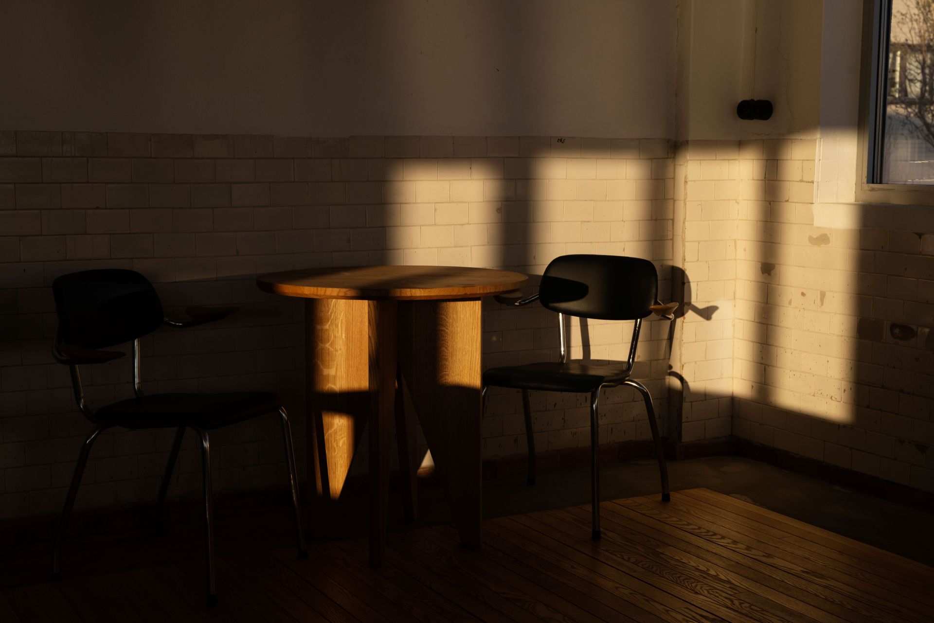 Chair and table in half shadow
