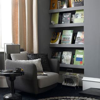 Living room shelving ideas with grey walls and grey painted shelves