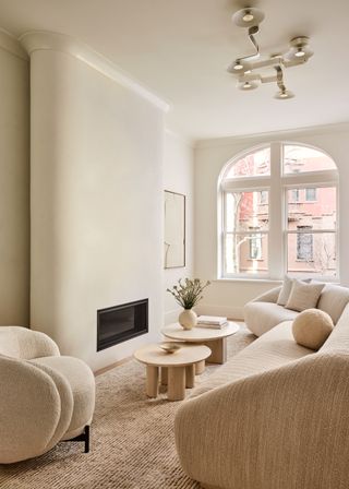 A living room with log burner focus
