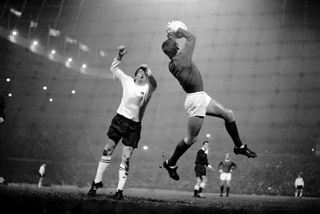 Manchester United goalkeeper Alex Stepney makes a save against Derby County in December 1969.