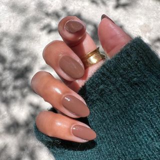 Oval shaped brown nails