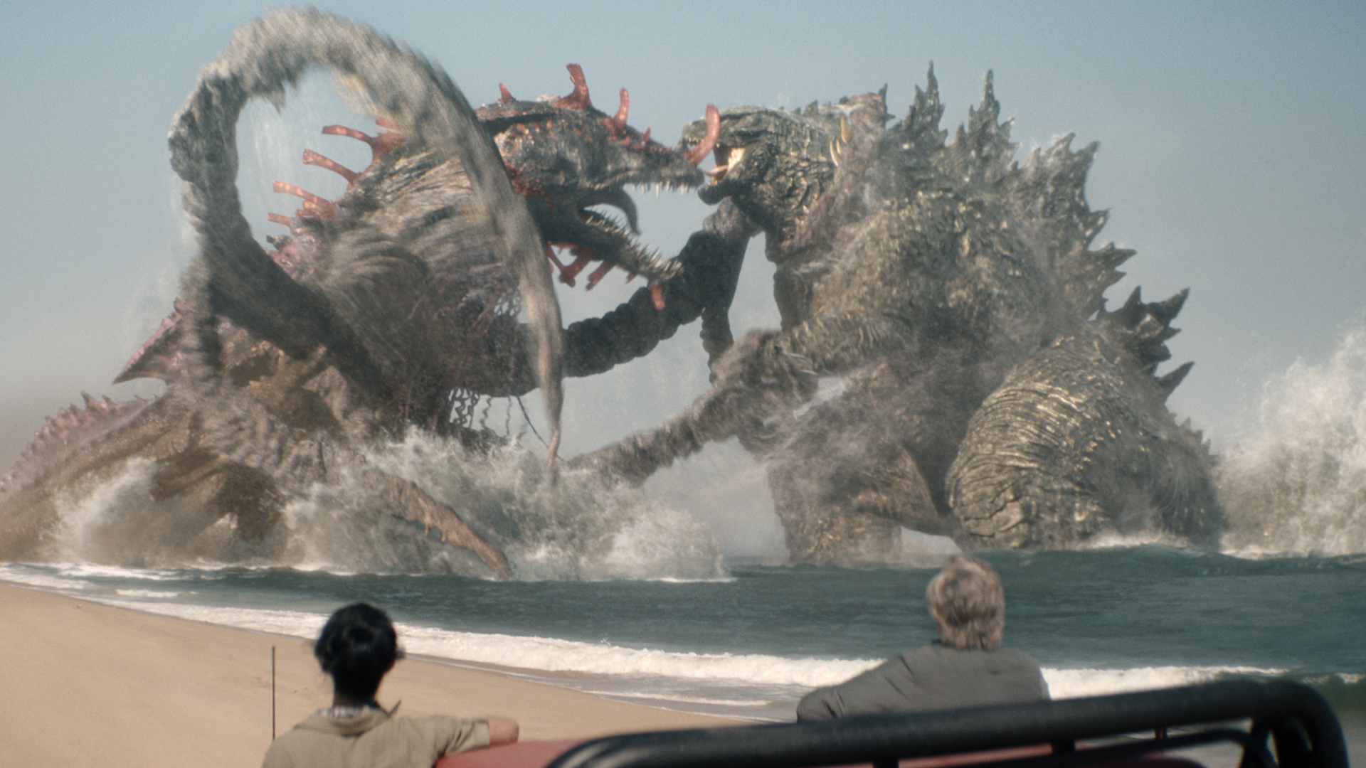 Titan X and Godzilla fighting as two humans watch on in Monarch: Legacy of Monsters season 2 episode 8