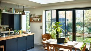 Open plan kitchen with patio doors looking to garden