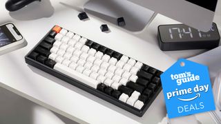 The Keychron K2 hot swappable keyboard on a desk in front of a Mac