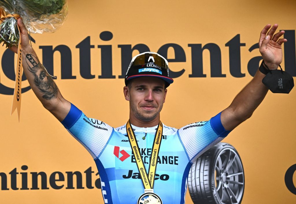 Team BikeexchangeJayco teams Dutch rider Dylan Groenewegen celebrates on the podium after the 3rd stage of the 109th edition of the Tour de France cycling race 182 km between Vejle and Sonderborg in Denmark on July 3 2022 Photo by AnneChristine POUJOULAT AFP Photo by ANNECHRISTINE POUJOULATAFP via Getty Images
