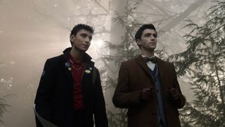 A still image of Charles and Edwin from Dead Boy Detectives, in a forest